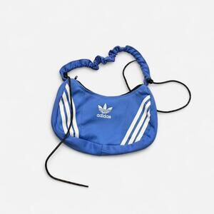 Blue Adidas shoulder bag with adjustable handle